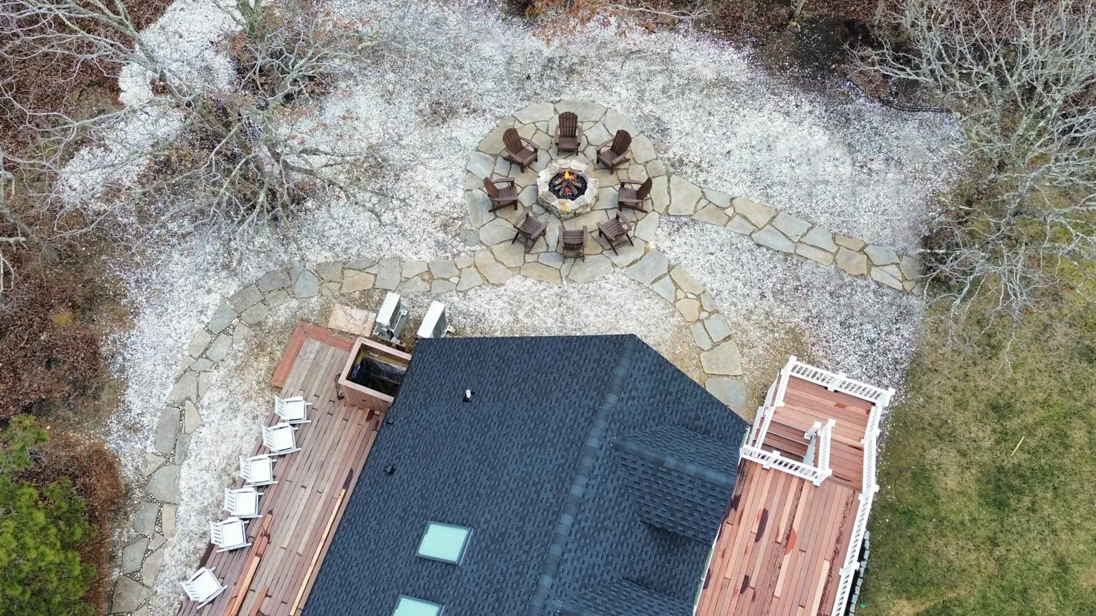 Finished fire pit area with curved planting border