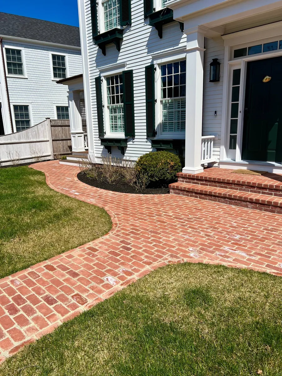 Herringbone brick walkway built for island freeze-thaw cycles on Martha's Vineyard